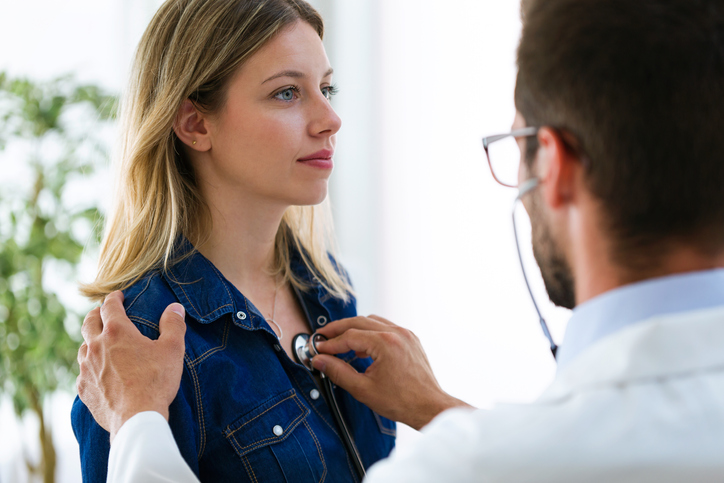 Checking woman's heart
