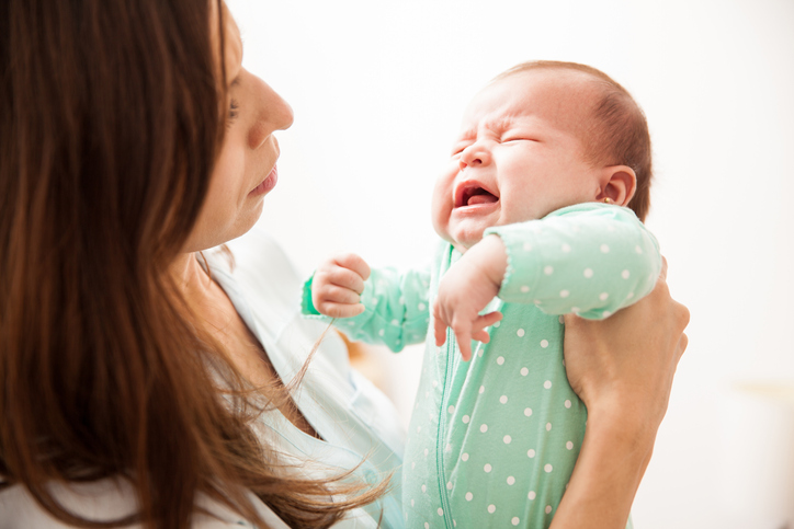 Woman holding infant
