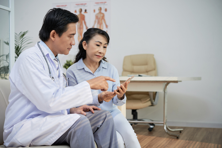 Doctor speaking to patient