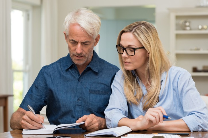 Couple looking through notes