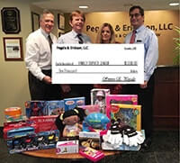 Pegalis Law Group, LLC donated toys and funding to Family Services League.