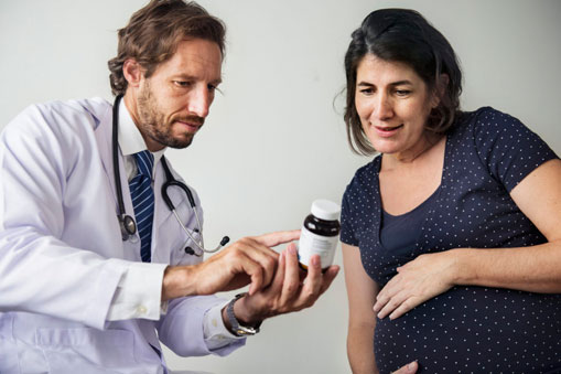 Doctor showing medication