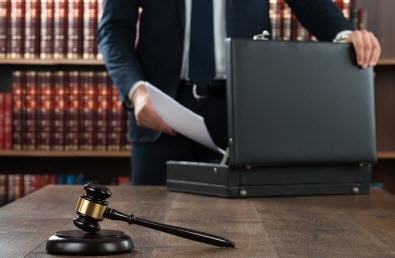 Lawyer opening briefcase